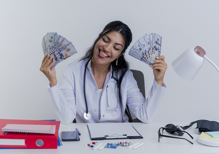 Doctor happy to receive Medical Factoring cash flow